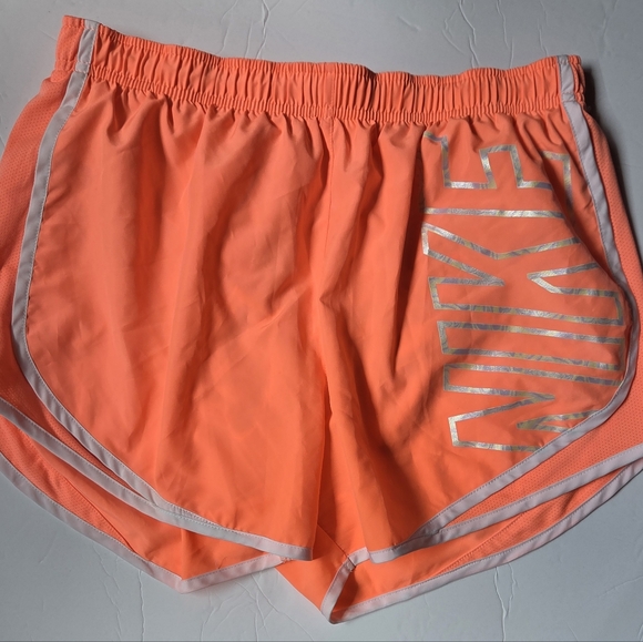 Nike Women's Running Shorts Size L Orange/White Iridescent Writing - Picture 1 of 5